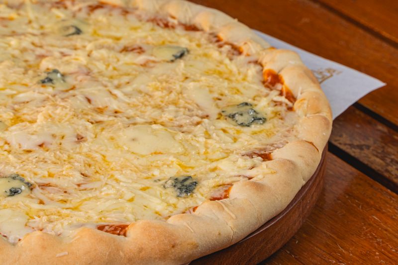 Rustic vegetarian pizza with fresh garden vegetables at Jet's pizza