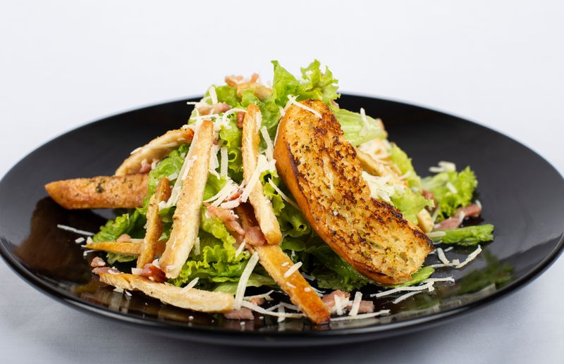 Caesar Salad with romaine, croutons and parmesan dressing